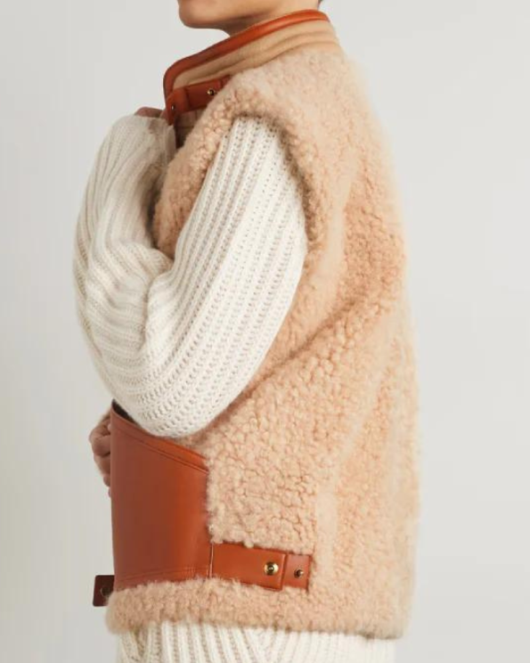 Quilted Leather Trimmed Shearling Vest.